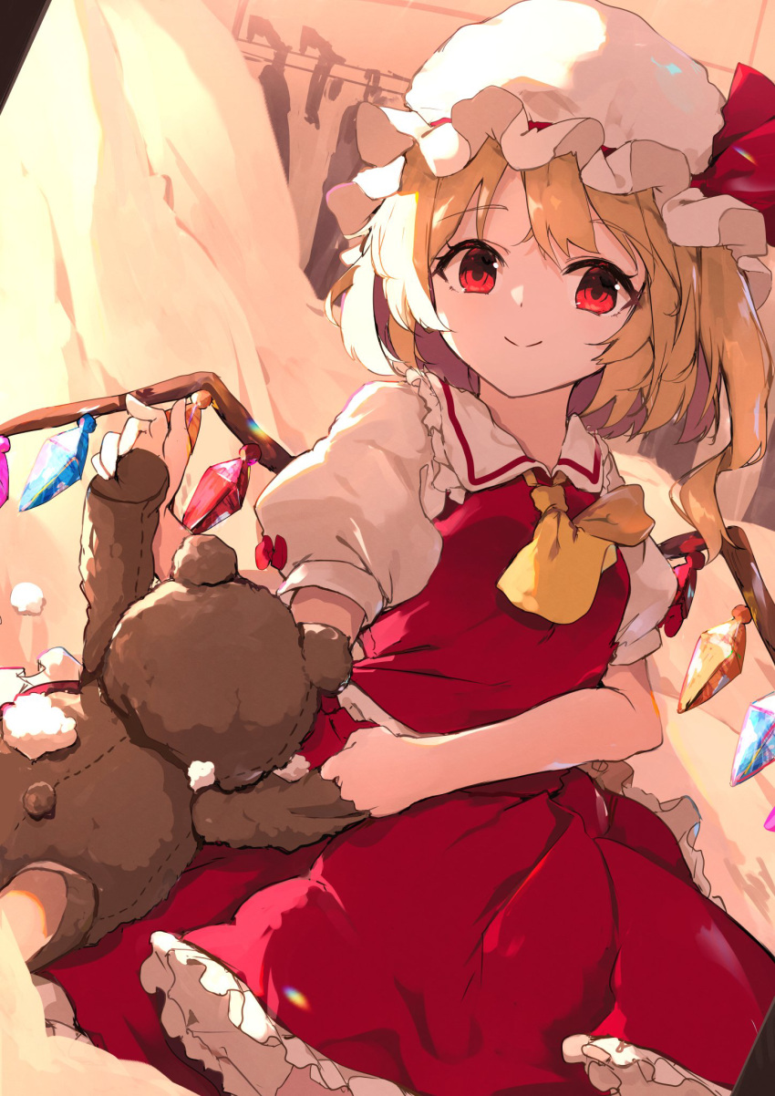 1girl ascot blonde_hair closed_mouth collared_shirt crystal eyebrows_visible_through_hair flandre_scarlet frilled_shirt_collar frills hat highres hunya long_hair mob_cap one_side_up puffy_short_sleeves puffy_sleeves red_eyes red_skirt red_vest shirt short_sleeves skirt smile solo stuffed_animal stuffed_toy teddy_bear touhou vest white_headwear white_shirt wings yellow_ascot