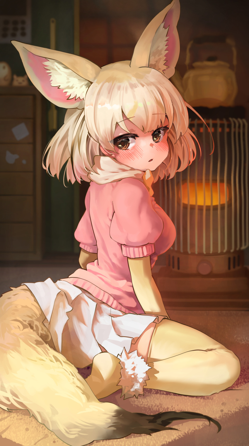 1girl animal_ear_fluff animal_ears ankle_cuffs bangs blonde_hair blurry blurry_background blush bob_cut calendar_(object) chest_of_drawers doll fennec_(kemono_friends) fox_ears fox_tail from_behind from_side heater highres indoors kemono_friends kerosene_heater kettle looking_at_viewer looking_back melaton miniskirt night no_shoes pink_sweater pleated_skirt puffy_short_sleeves puffy_sleeves rug short_hair short_sleeves sitting skirt solo sweater tail wariza white_skirt