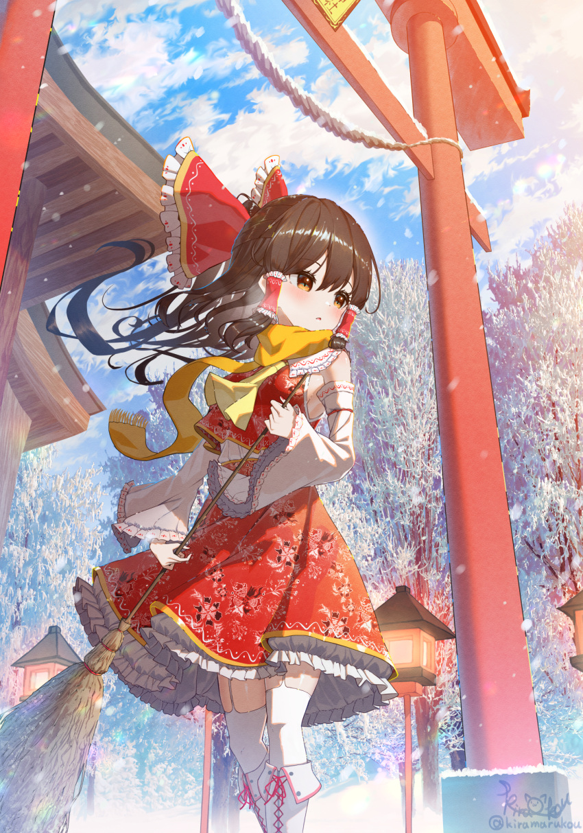 1girl ascot bangs bare_shoulders blush boots bow breasts broom brown_eyes closed_mouth detached_sleeves eyelashes floral_print frilled_bow frilled_skirt frilled_sleeves frills garter_straps hair_bow hair_ribbon hair_tubes hakurei_reimu hakurei_shrine highres holding holding_broom kiramarukou knee_boots lantern long_hair long_sleeves looking_to_the_side medium_breasts nontraditional_miko red_bow red_ribbon red_skirt red_vest ribbon rope scarf shimenawa sidelocks signature skirt snow snowing solo standing torii touhou twitter_username vest white_footwear white_sleeves wide_sleeves winter yellow_ascot yellow_scarf