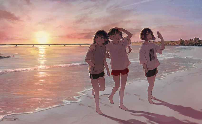 3girls arm_around_shoulder barefoot beach blue_eyes bridge closed_mouth daluto_(hitomi555) footprints hand_in_pocket hand_on_own_head highres holding holding_phone hood hoodie horizon long_hair looking_up multiple_girls open_mouth original phone sand shirt short_hair shorts sunset twintails water waves white_shirt