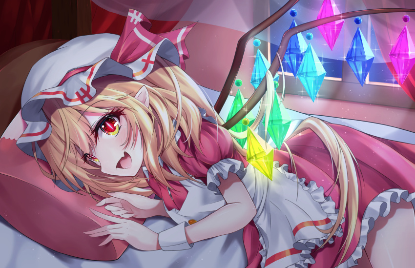 1girl :d alternate_costume apron blonde_hair breasts cowboy_shot crystal dress eyebrows_visible_through_hair fang flandre_scarlet frilled_apron frilled_dress frills hat hat_ribbon highres indoors lying medium_hair mob_cap on_bed on_side open_mouth pillow pointy_ears print_apron print_headwear puffy_short_sleeves puffy_sleeves rainbow_order red_dress red_eyes red_ribbon ribbon s_vileblood short_sleeves side_ponytail skin_fang small_breasts smile solo touhou white_apron white_headwear window wings
