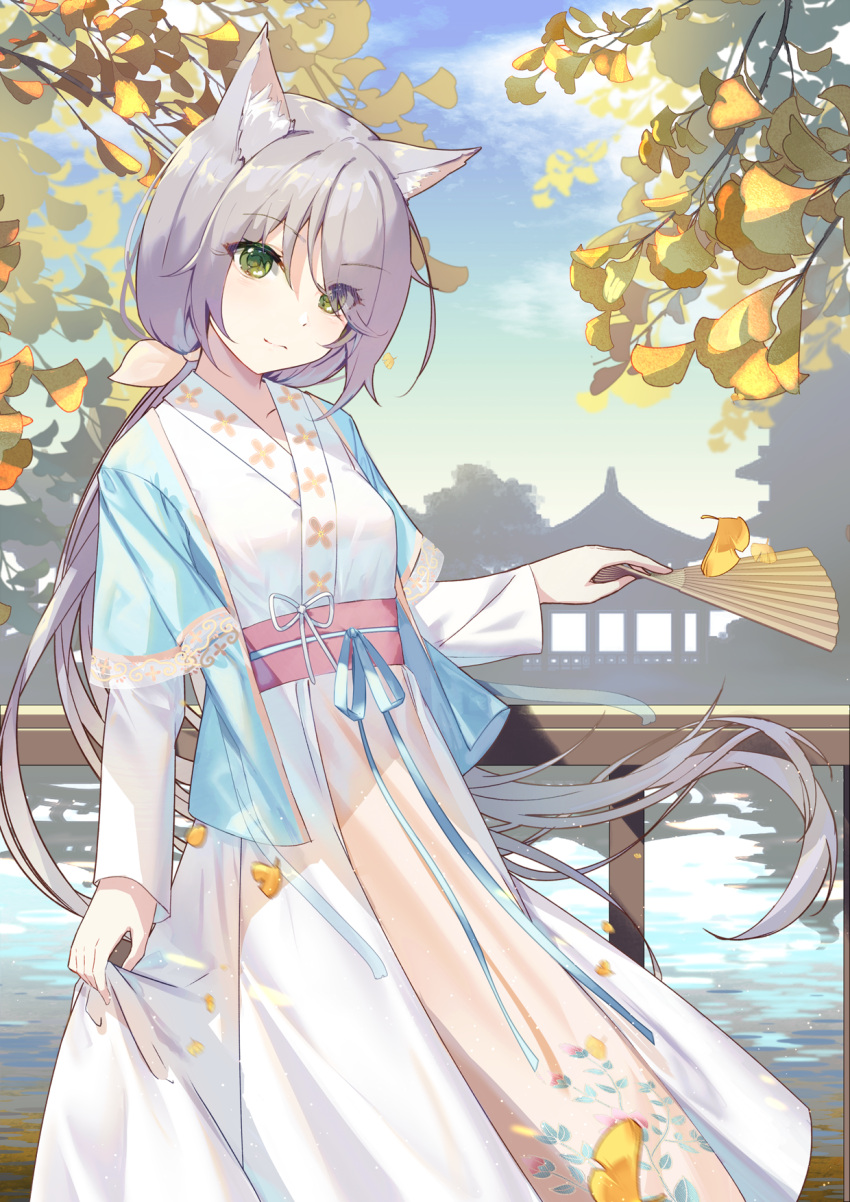 1girl animal_ear_fluff animal_ears blue_jacket chinese_clothes closed_mouth commentary_request day eyebrows_visible_through_hair eyes_visible_through_hair folding_fan ginkgo_leaf green_eyes grey_hair hair_over_one_eye hand_fan hanfu head_tilt highres holding holding_fan jacket japanese_clothes kimono layered_sleeves long_hair long_sleeves looking_at_viewer low_ponytail mo_(pixiv9929995) obi open_clothes open_jacket original outdoors ponytail railing sash short_over_long_sleeves short_sleeves solo very_long_hair water white_kimono wide_sleeves