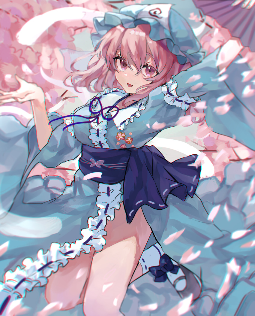 1girl absurdres black_footwear blue_headwear blue_kimono blush cherry_blossoms folding_fan frilled_kimono frilled_sleeves frills hair_between_eyes hand_fan hat highres holding holding_fan japanese_clothes kani_nyan kimono long_sleeves mob_cap open_mouth petals pink_eyes pink_hair saigyouji_yuyuko shoes short_hair smile solo symbol-only_commentary touhou triangular_headpiece white_legwear wide_sleeves