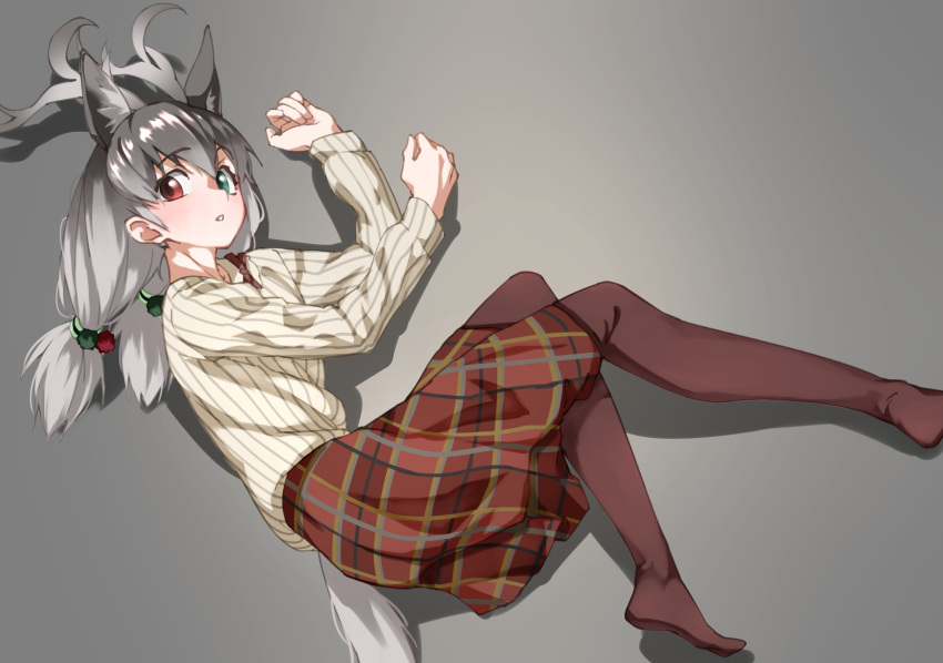 1girl animal_ear_fluff animal_ears antlers bangs brown_legwear commentary deer_ears deer_tail extra_ears eyebrows_visible_through_hair from_above gradient_hair green_eyes grey_background grey_hair hair_between_eyes heterochromia highres kemono_friends long_hair long_skirt long_sleeves looking_at_viewer looking_up low_twintails lying multicolored_hair on_side pantyhose parted_lips plaid plaid_skirt red_eyes reindeer_(kemono_friends) reindeer_antlers shirt simple_background skirt solo striped striped_shirt tail tanabe_(fueisei) twintails vertical-striped_shirt vertical_stripes white_hair