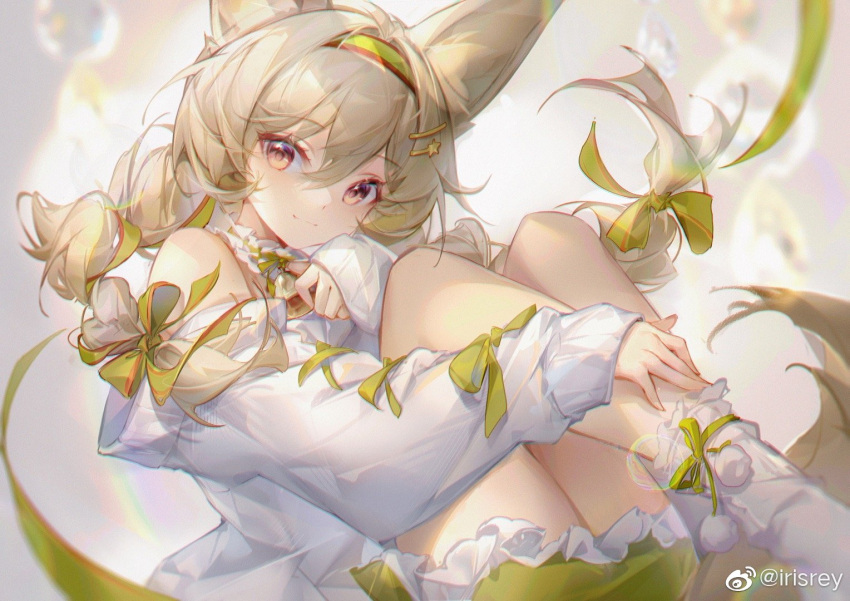 1girl animal_ear_fluff animal_ears arknights artist_name bangs bare_shoulders beanstalk_(arknights) beanstalk_(gift_uncompleted)_(arknights) bell bow closed_mouth detached_sleeves eyebrows_visible_through_hair frilled_shorts frills green_bow green_hairband green_shorts hair_between_eyes hair_bow hair_ornament hairband hairclip irisrey legs_up lens_flare long_sleeves looking_at_viewer neck_bell neck_garter no_shoes official_alternate_costume pom_pom_(clothes) red_eyes shorts sitting sleeves_past_wrists smile socks solo star_(symbol) star_hair_ornament sweater weibo_username white_legwear white_sweater