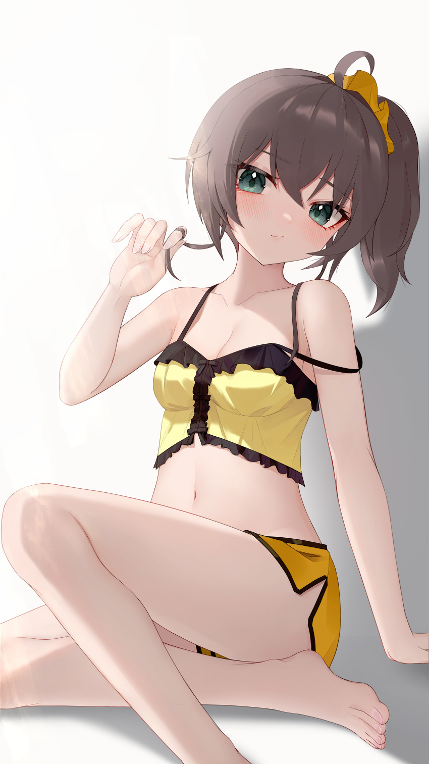 1girl absurdres bangs bare_legs bare_shoulders barefoot blush breasts brown_hair camisole closed_mouth commentary_request crop_top eyebrows_visible_through_hair green_eyes hair_between_eyes hair_ornament hair_scrunchie hand_up highres hololive looking_at_viewer midriff natsuiro_matsuri navel playing_with_own_hair scrunchie shirt short_hair short_shorts shorts side_ponytail sitting small_breasts solo strap_slip thomas_8000 virtual_youtuber white_background yellow_shirt yellow_shorts
