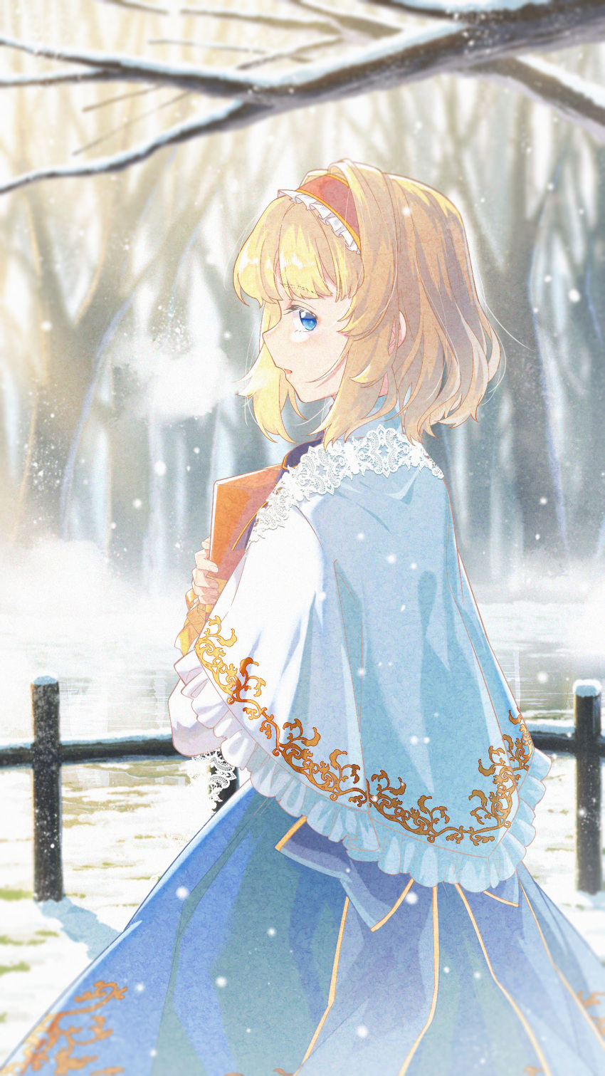 1girl absurdres alice_margatroid back_bow bangs blonde_hair blue_bow blue_dress blue_eyes book bow breath capelet chinese_commentary commentary_request dress eyebrows_visible_through_hair fence frilled_hairband frills hairband highres holding holding_book jiege long_sleeves looking_at_viewer medium_hair outdoors red_hairband snowing solo touhou tree upper_body white_capelet winter