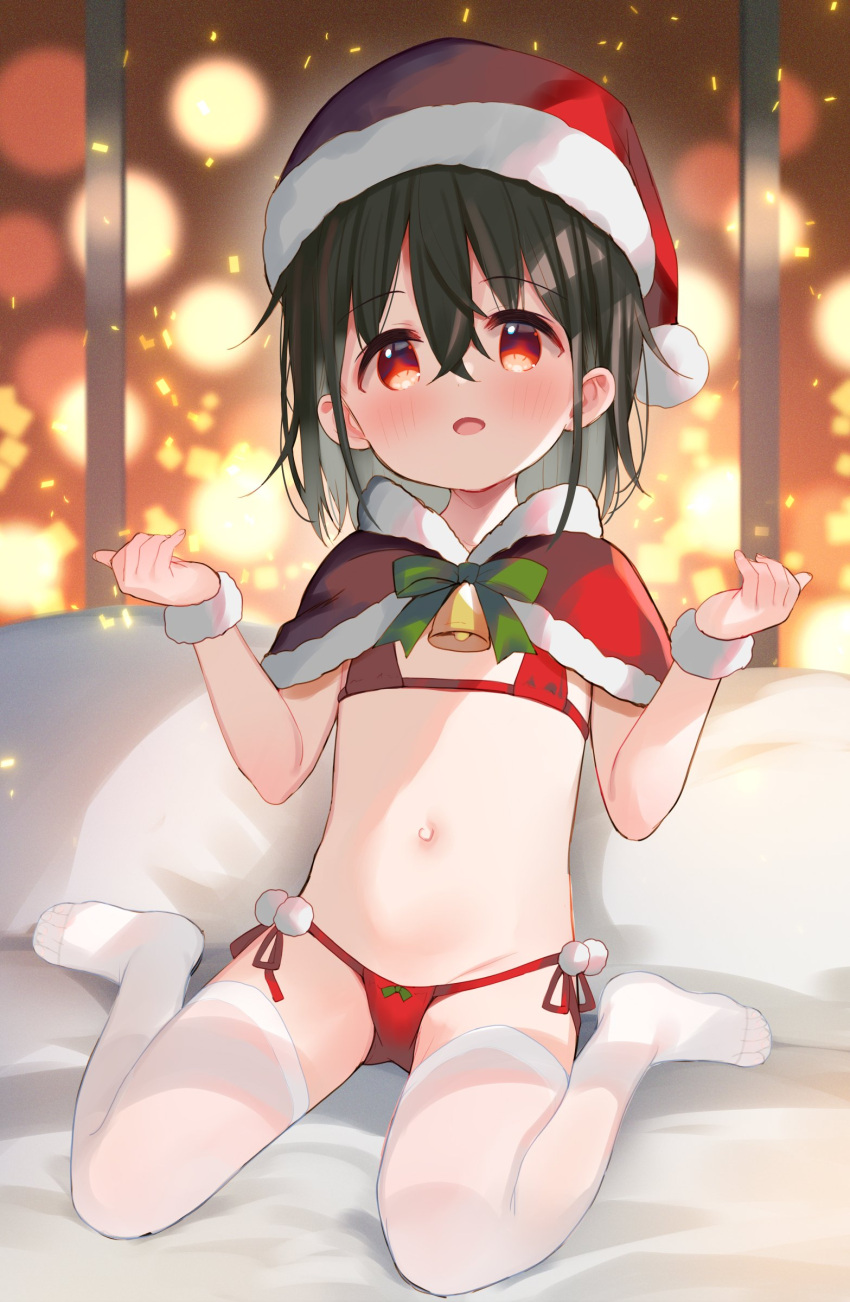 1girl :d absurdres bangs bell bikini black_hair blush bow capelet commentary eyebrows_visible_through_hair fur-trimmed_capelet fur-trimmed_headwear fur_trim green_bow hair_between_eyes hands_up hat highres meito_(maze) navel no_shoes original pillow red_bikini red_capelet red_eyes red_headwear santa_hat side-tie_bikini sitting smile solo swimsuit symbol-only_commentary thigh-highs wariza white_legwear