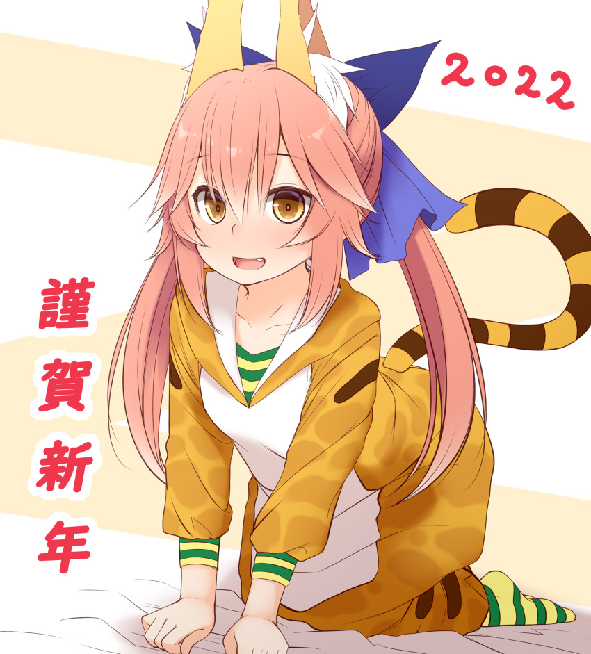 1girl 2022 :d akeome all_fours animal_costume animal_ear_fluff animal_ears animal_print bangs blue_ribbon brown_eyes chinese_zodiac collarbone commentary_request eyebrows_visible_through_hair fang fate/extra fate_(series) fox_ears fox_girl hair_between_eyes hair_ribbon happy_new_year haryuu_(poetto) highres hood hood_down long_hair looking_at_viewer new_year pink_hair ribbon simple_background smile solo tail tamamo_(fate) tamamo_no_mae_(fate/extra) tiger_costume tiger_print tiger_tail translation_request twintails year_of_the_tiger younger