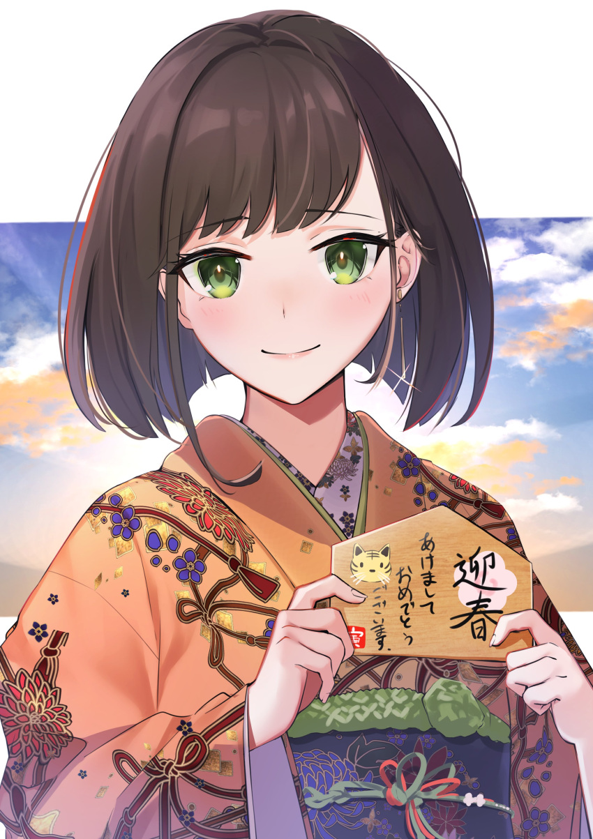 1girl absurdres brown_hair chinese_zodiac closed_mouth clouds commentary earrings ema eyebrows_visible_through_hair green_eyes highres holding japanese_clothes jewelry kimono long_hair long_sleeves looking_at_viewer obi orange_kimono original print_kimono sash short_hair sky smile solo symbol-only_commentary trapiorra upper_body year_of_the_tiger