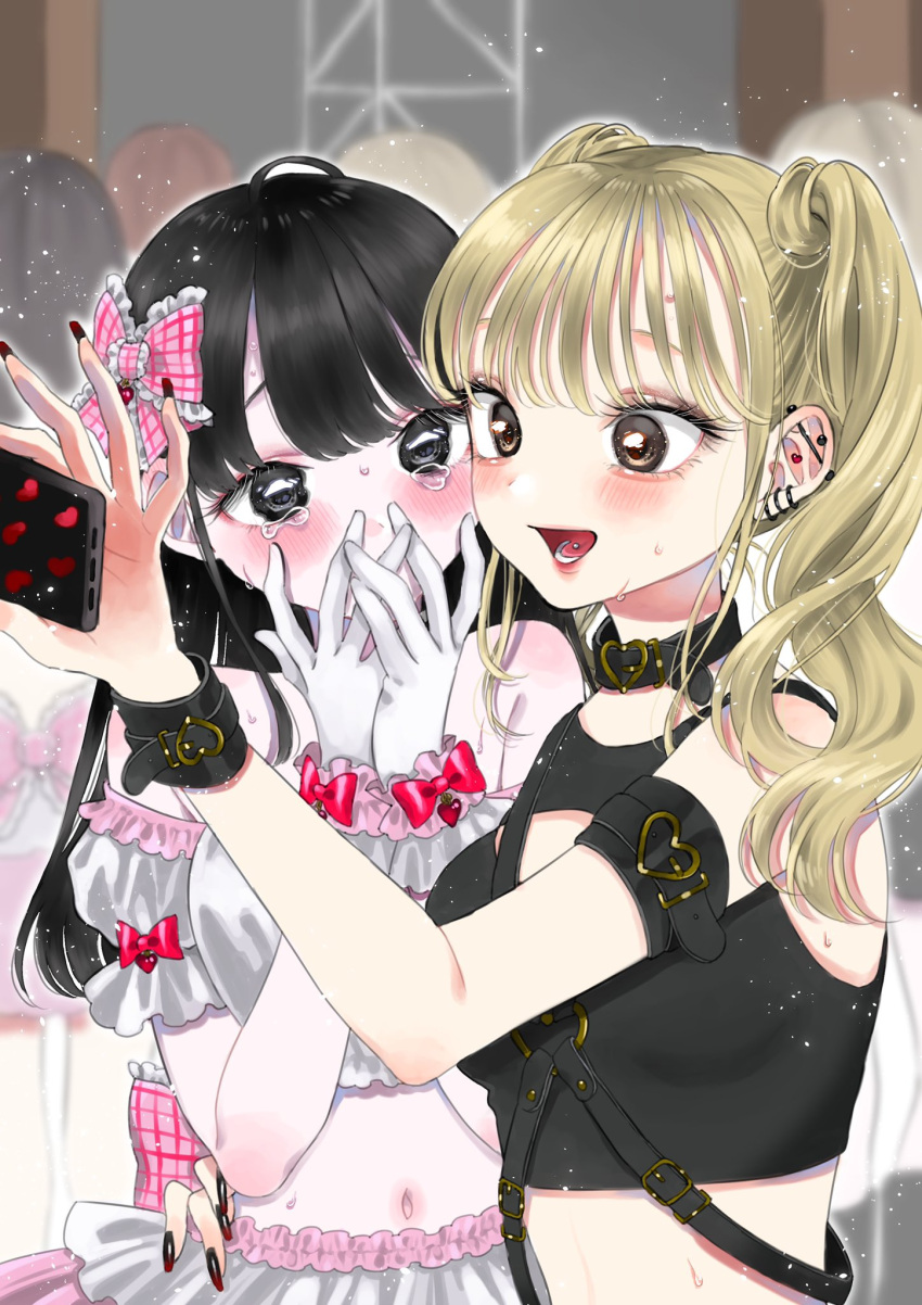 2girls :d arm_around_waist black_hair blonde_hair blurry blurry_background blush bow breasts brown_eyes brown_nails checkered_bow checkered_clothes cleavage_cutout clothing_cutout crop_top crying crying_with_eyes_open depth_of_field detached_sleeves ear_piercing earrings fingernails frilled_bow frills gloves grey_skirt hair_bow hands_up heart heart_earrings heart_pendant highres holding holding_phone jewelry kawai_rou long_fingernails long_hair midriff multiple_girls nail_polish navel open_mouth oshi_ga_imouto_ni_narimashite pale_skin phone piercing pink_bow puffy_detached_sleeves puffy_short_sleeves puffy_sleeves red_bow selfie short_sleeves shoulder_blush skirt small_breasts smile sweat tears tongue_piercing twintails white_gloves wide-eyed wrist_belt yuri