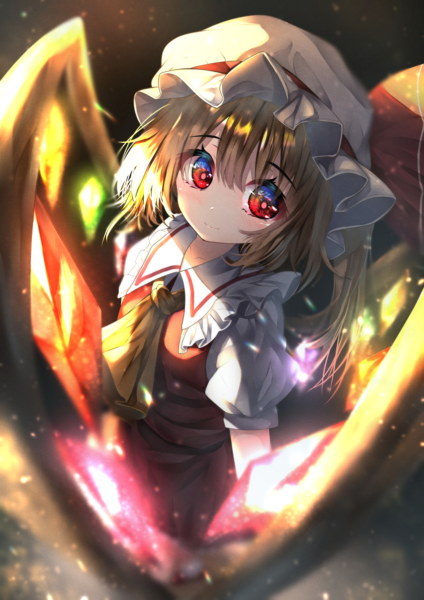 1girl absurdres ascot blonde_hair blurry blurry_foreground breasts closed_mouth collarbone collared_shirt crystal dark_background dfra eyebrows_visible_through_hair flandre_scarlet frilled_shirt_collar frills glowing glowing_wings hair_between_eyes hat hat_ribbon highres looking_at_viewer medium_hair mob_cap one_side_up puffy_short_sleeves puffy_sleeves red_eyes red_ribbon red_skirt red_vest ribbon shirt short_sleeves skirt small_breasts smile solo touhou vest white_headwear wings yellow_ascot