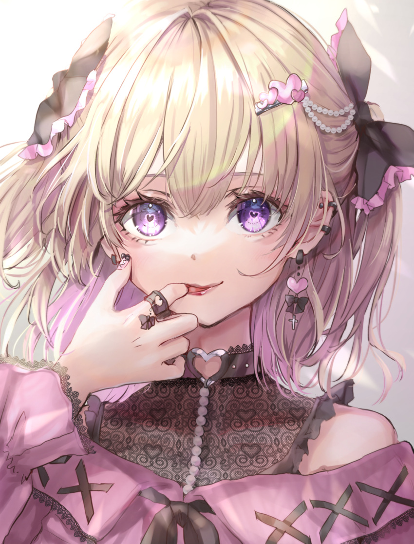 1girl bangs black_bow blonde_hair blouse bow choker commentary_request ear_piercing earrings finger_in_mouth frilled_bow frills hair_between_eyes hair_bow heart heart-shaped_pupils heart_ring highres jewelry lace light_blush lips looking_at_viewer medium_hair original piercing pink_blouse ring shironeko_yuuki solo standing swept_bangs symbol-shaped_pupils upper_body violet_eyes