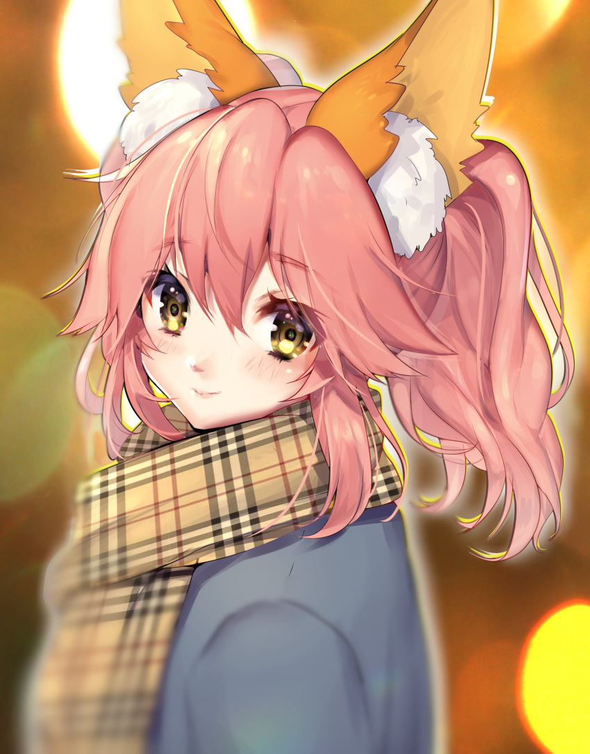 1girl absurdres animal_ear_fluff animal_ears bangs blurry blurry_background blurry_foreground closed_mouth commentary eyebrows_visible_through_hair fate_(series) fox_ears fox_girl hair_between_eyes highres light_blush light_smile looking_at_viewer mogullaz pink_hair plaid plaid_scarf scarf sidelocks solo split_ponytail tamamo_(fate) tamamo_no_mae_(fate/extra) upper_body winter_clothes yellow_eyes