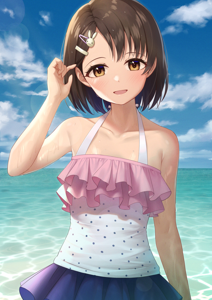 1girl absurdres animal_hair_ornament arm_up bangs bare_arms blue_sky brown_eyes brown_hair clouds collarbone commentary_request cowboy_shot day frilled_swimsuit frills hair_ornament hairclip highres horizon idolmaster idolmaster_cinderella_girls looking_at_viewer ocean one-piece_swimsuit open_mouth outdoors polka_dot polka_dot_swimsuit sasaki_chie short_hair sky smile solo standing swimsuit swimsuit_skirt tsunenorip white_swimsuit