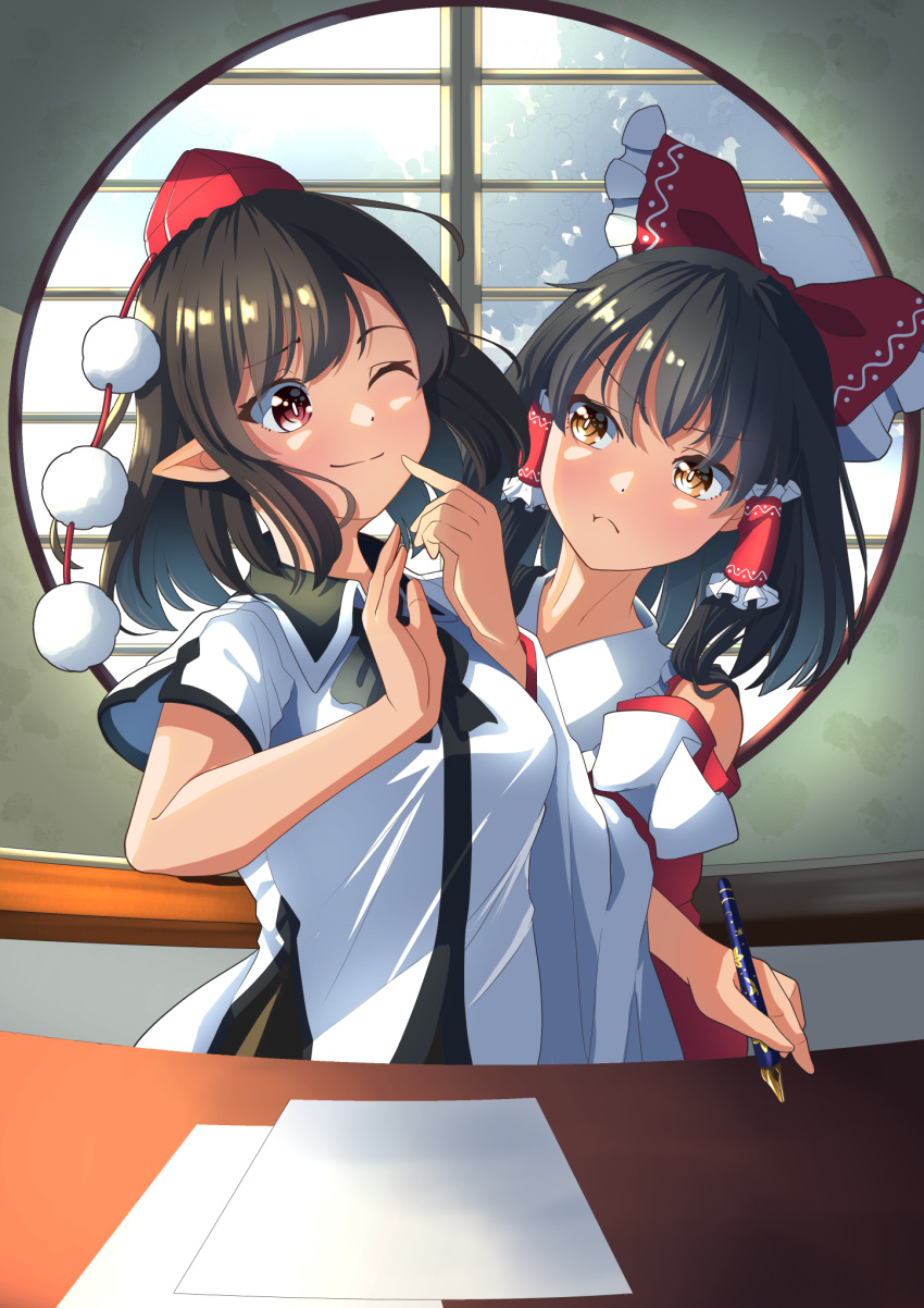 2girls amanoyayuki bare_shoulders black_hair blush bow brown_eyes closed_mouth collared_shirt detached_sleeves eyebrows_visible_through_hair hair_between_eyes hair_bow hair_tubes hakurei_reimu hat highres holding holding_pen japanese_clothes medium_hair multiple_girls nontraditional_miko one_eye_closed paper pen pointy_ears pom_pom_(clothes) pout red_bow red_eyes red_headwear shameimaru_aya shirt short_hair short_sleeves sidelocks tokin_hat touhou white_shirt wide_sleeves