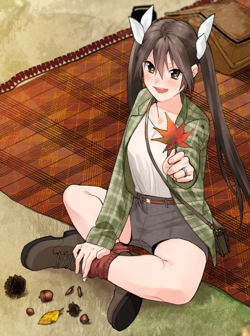 1girl acorn alternate_costume bangs blush boots brown_eyes brown_footwear brown_hair brown_legwear day grey_shorts hair_between_eyes highres holding holding_leaf jacket kantai_collection leaf long_hair long_sleeves looking_at_viewer open_clothes open_jacket open_mouth outdoors picnic picnic_basket pinecone plaid plaid_jacket shirt shishanmo shorts sitting socks solo tone_(kancolle) twintails very_long_hair white_shirt