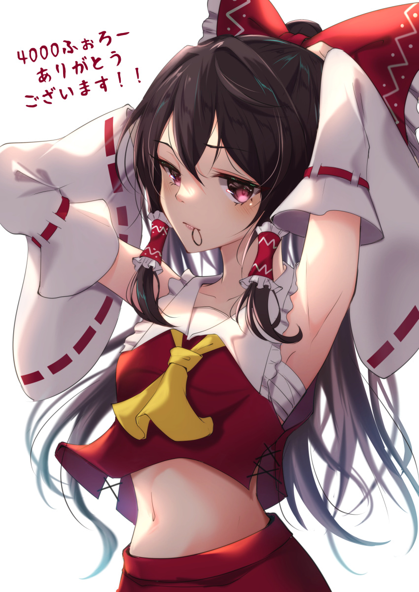 1girl alternate_eye_color armpits arms_up ascot bangs bare_shoulders blush bow breasts brown_hair collarbone detached_sleeves eyelashes frilled_shirt_collar frills hair_between_eyes hair_bow hair_tubes hakurei_reimu highres lips long_hair looking_at_viewer midriff mouth_hold navel nontraditional_miko red_skirt sarashi simple_background skirt small_breasts solo standing stomach touhou upper_body violet_eyes wide_sleeves yamanakaume yellow_ascot