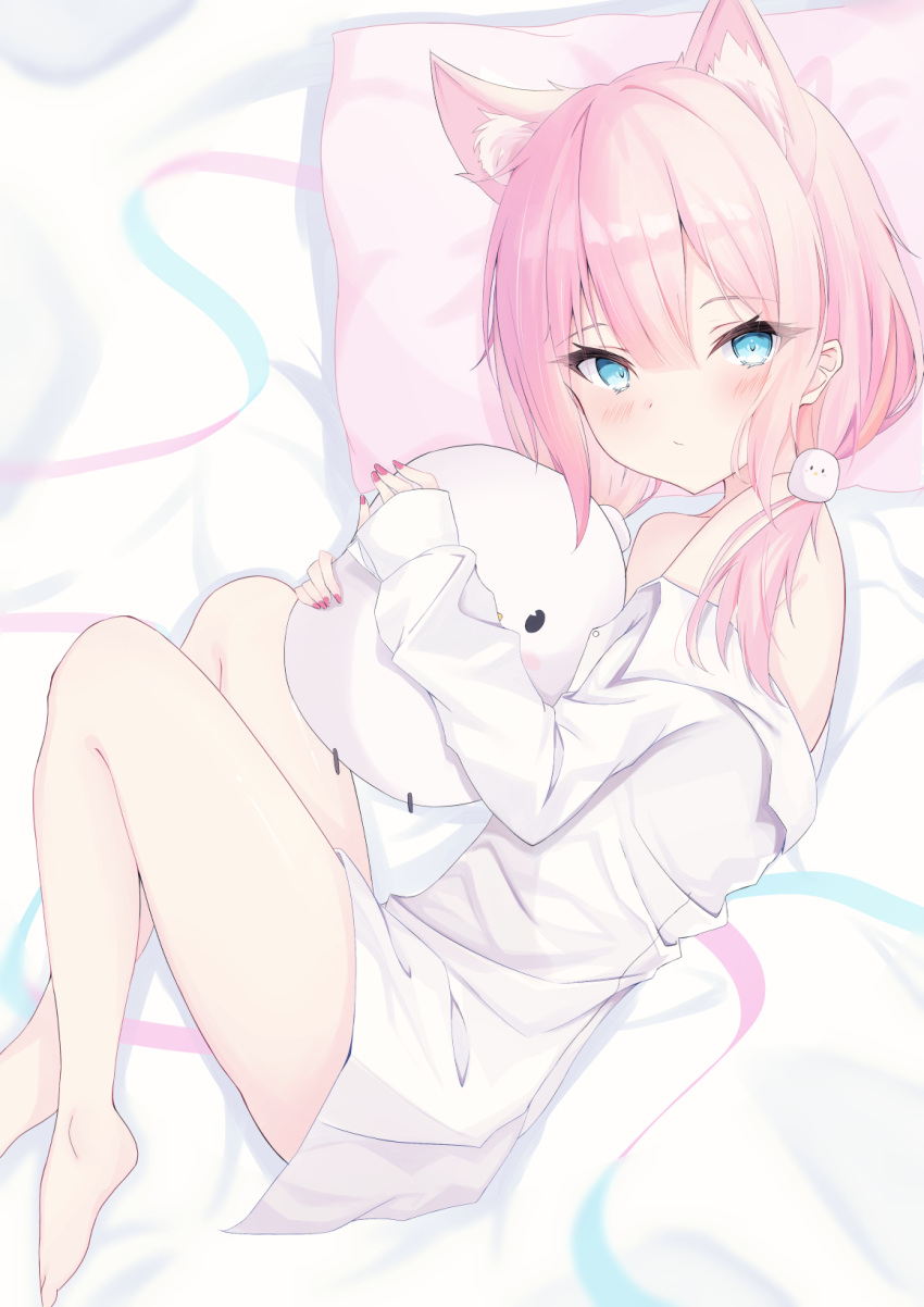 1girl animal_ear_fluff animal_ears bangs bare_legs bare_shoulders barefoot bed_sheet blue_eyes blush brown_hair cat_ears closed_mouth collared_shirt commentary_request eyebrows_visible_through_hair feet_out_of_frame hair_between_eyes hair_ornament highres indie_virtual_youtuber long_hair long_sleeves looking_at_viewer low_twintails lying multicolored_hair nail_polish naked_shirt object_hug off_shoulder on_side pillow pink_hair red_nails sakurada_hane shirt sleeves_past_wrists twintails two-tone_hair virtual_youtuber white_shirt yunominomi