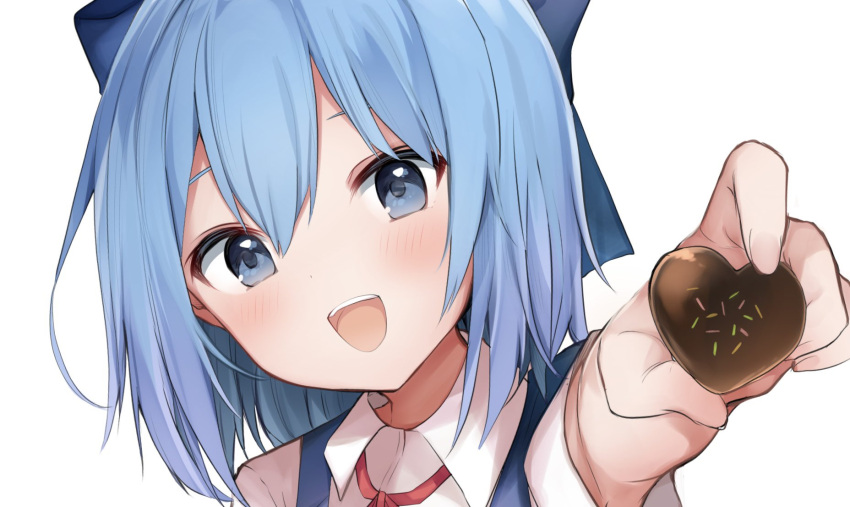 1girl :d bangs blue_bow blue_eyes blue_hair bow candy chocolate cirno collared_shirt eyebrows_behind_hair food hair_bow heart heart-shaped_chocolate highres holding holding_chocolate holding_food incoming_food karasusou_nano looking_at_viewer open_mouth shirt short_hair short_sleeves simple_background smile solo touhou upper_body white_background white_shirt