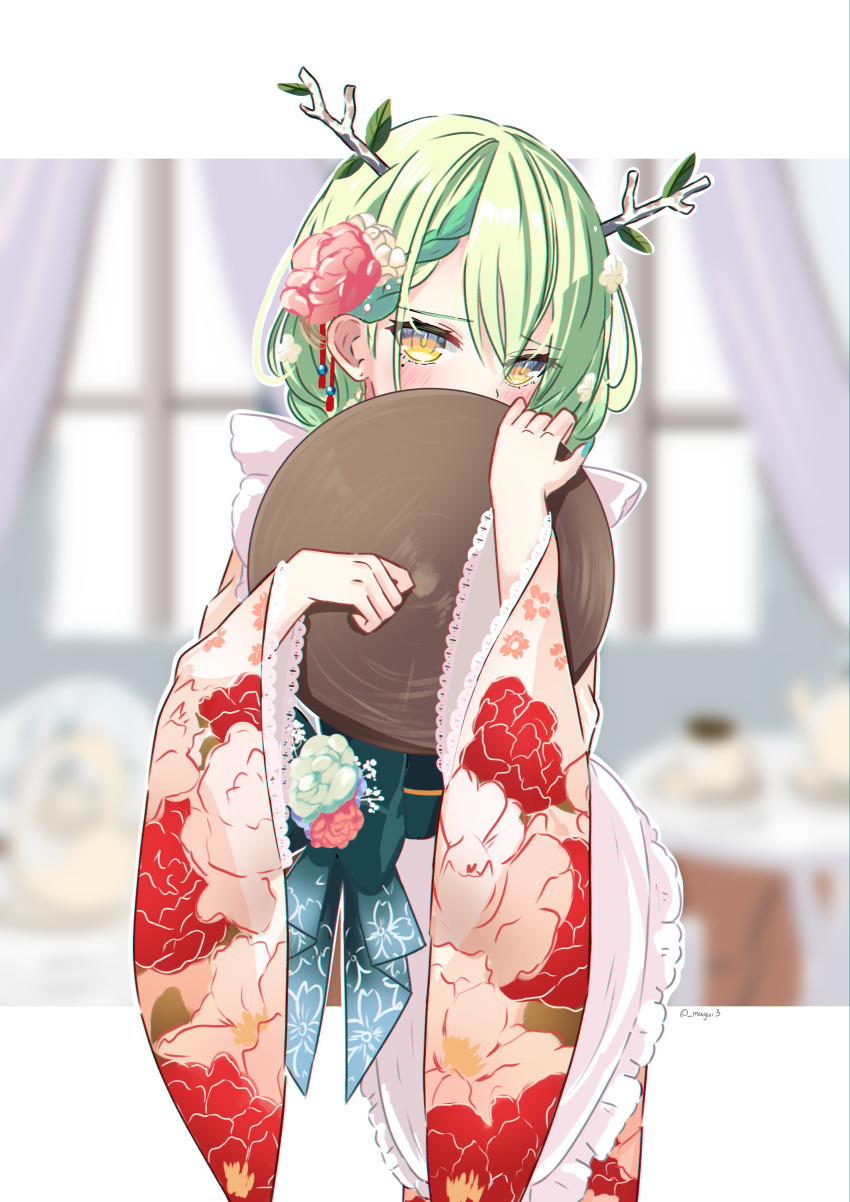 1girl absurdres antlers blurry blurry_background blush branch ceres_fauna english_commentary floral_print flower green_hair hair_flower hair_ornament highres hololive hololive_english japanese_clothes kimono leaf long_sleeves looking_at_viewer magui3 mole mole_under_eye solo tray twitter_username upper_body virtual_youtuber wide_sleeves yellow_eyes