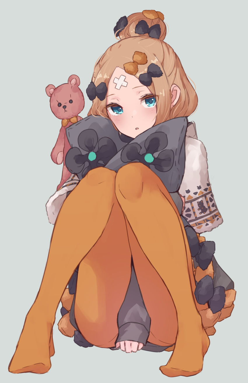 1girl abigail_williams_(fate) absurdres bandaid bandaid_on_forehead blue_eyes bow fate/grand_order fate_(series) grey_background hair_bow hair_bun highres kopaka_(karda_nui) looking_at_viewer multiple_hair_bows no_shoes open_mouth orange_legwear pantyhose simple_background sitting sleeves_past_wrists solo stuffed_animal stuffed_toy teddy_bear winter_caravan_online_2021