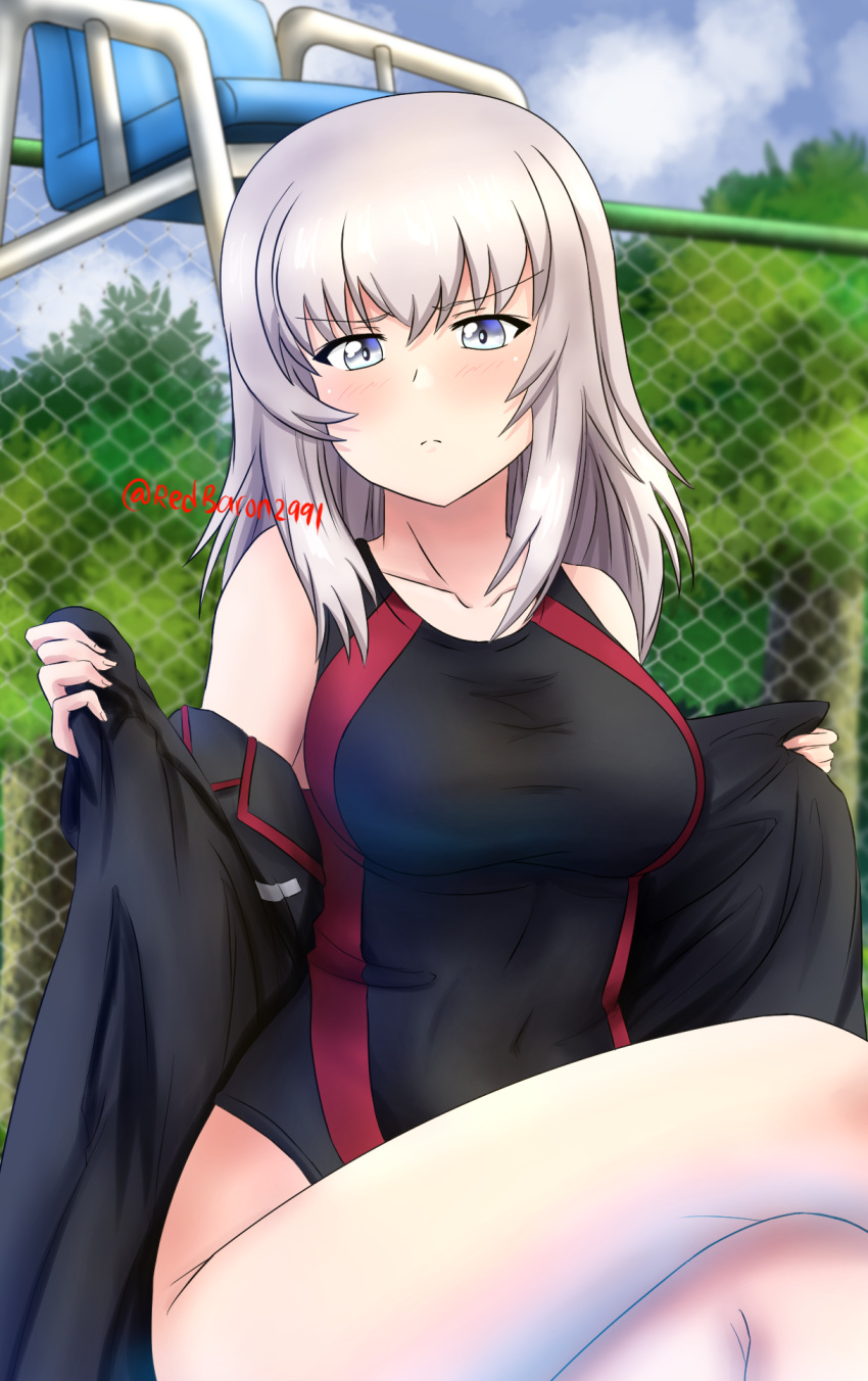 1girl bangs black_jacket black_swimsuit blue_eyes blue_sky blurry blurry_background blush chain-link_fence closed_mouth clouds cloudy_sky commentary covered_navel crossed_legs day depth_of_field eyebrows_visible_through_hair fence frown girls_und_panzer glaring highres itsumi_erika jacket jacket_pull lifeguard_chair looking_at_viewer medium_hair one-piece_swimsuit outdoors pull redbaron silver_hair sitting sky solo swimsuit twitter_username