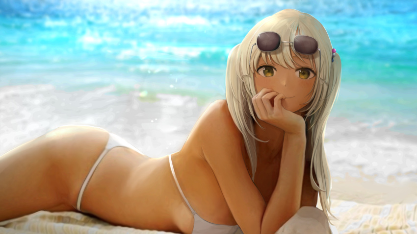 1girl alternate_costume arm_support beach beach_towel bikini blonde_hair blurry blurry_background blush breasts chan1moon closed_mouth commentary cowboy_shot dark-skinned_female dark_skin day english_commentary eyewear_on_head head_rest hololive hololive_english long_hair looking_at_viewer lying medium_breasts ocean on_stomach outdoors planet_hair_ornament smile solo string_bikini sunglasses swimsuit tinted_eyewear towel tsukumo_sana twintails virtual_youtuber white_bikini yellow_eyes