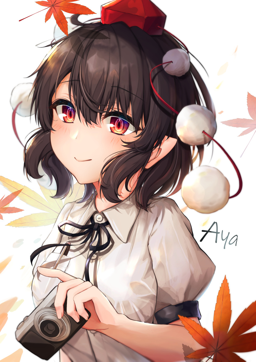 1girl absurdres autumn_leaves bangs black_bow black_bowtie blush bow bowtie breasts brown_hair buttons camera character_name closed_mouth collared_shirt commentary_request eyebrows_visible_through_hair fingernails hair_between_eyes hand_up hat highres hira-san leaf looking_at_viewer medium_breasts pen pocket pointy_ears pom_pom_(clothes) puffy_short_sleeves puffy_sleeves red_eyes red_headwear shameimaru_aya shirt short_hair short_sleeves smile solo tokin_hat touhou upper_body white_background white_shirt