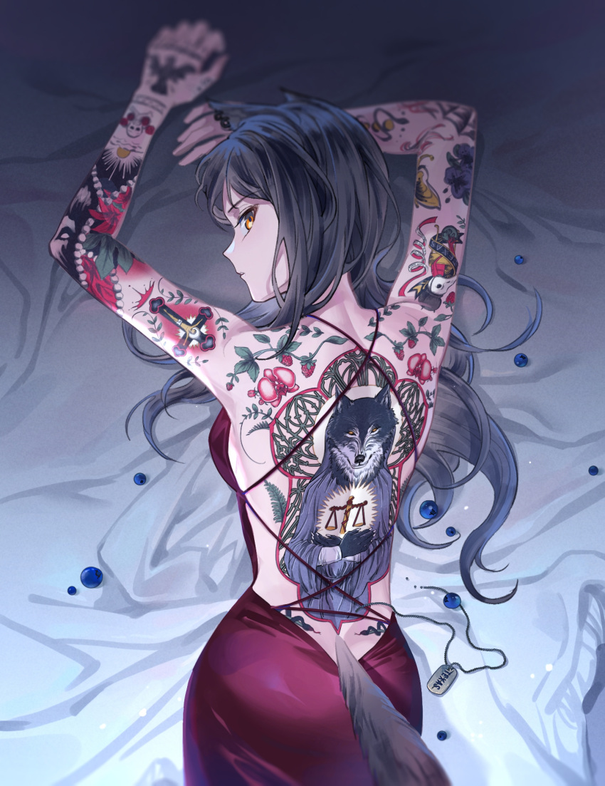 1girl alternate_costume animal_ears arknights arms_up ass back bangs bare_arms bare_back bare_shoulders bed_sheet black_dress black_hair breasts cowboy_shot dog_tags dress eyebrows_visible_through_hair from_above from_behind full-body_tattoo haidan_uniiii highres long_hair looking_at_viewer looking_back looking_up lying medium_breasts on_bed on_stomach orange_eyes parted_lips purple_dress sideboob solo tail tattoo texas_(arknights) wolf_ears wolf_girl wolf_tail