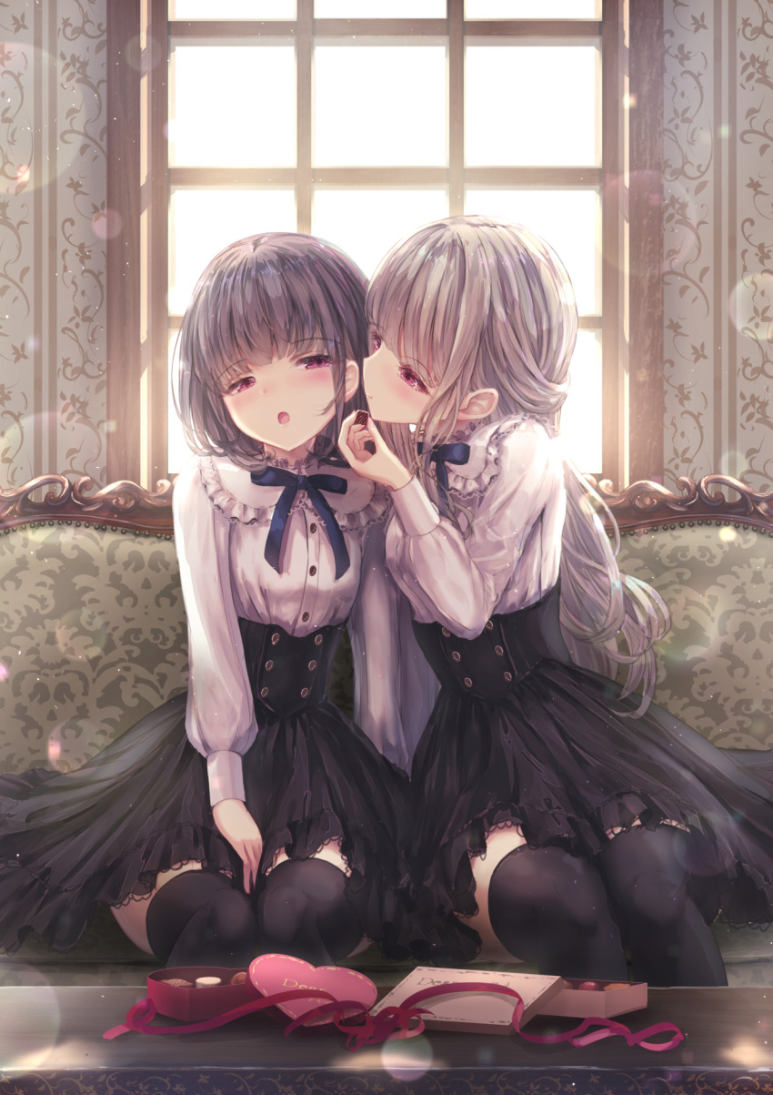 2girls black_hair black_legwear black_skirt blue_bow bow box chocolate commentary_request couch day food gift gift_box grey_hair heart-shaped_box highres holding holding_food indoors long_hair long_sleeves missile228 multiple_girls on_couch original puffy_long_sleeves puffy_sleeves sitting skirt sunlight table thigh-highs valentine very_long_hair violet_eyes window yuri