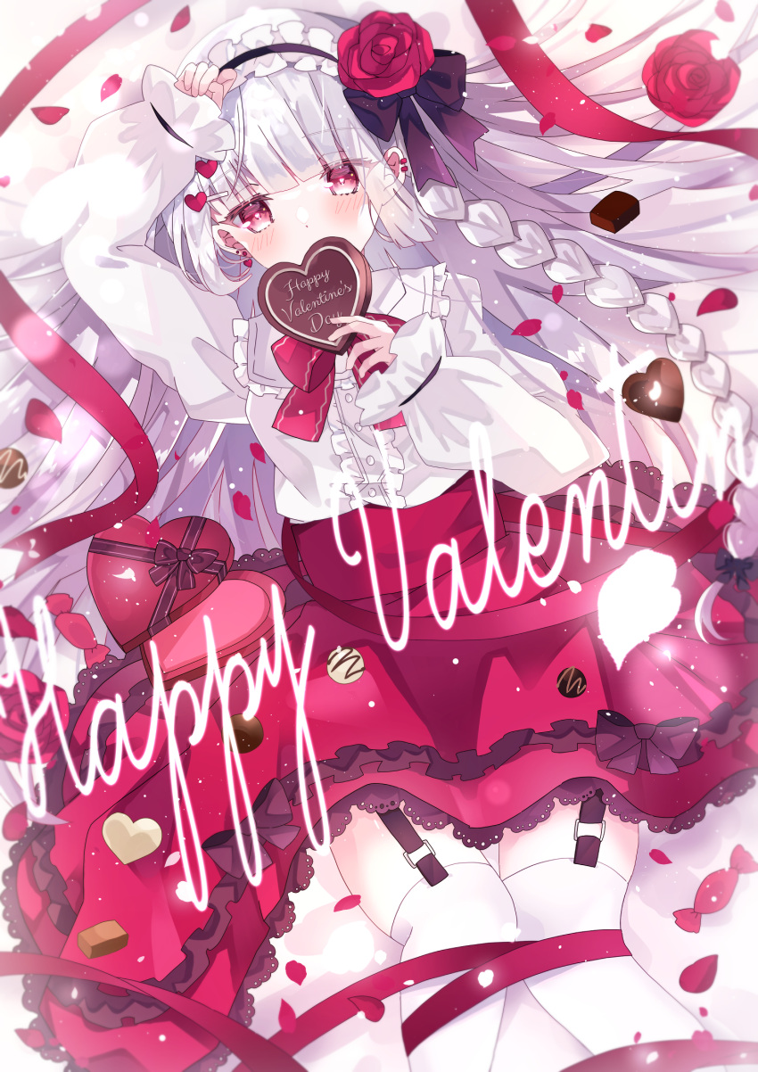 1girl aoi_yugina bangs box braid center_frills chocolate commentary dress_shirt earclip english_text eyebrows_visible_through_hair flower food frilled_hairband frills from_above garter_straps gift grey_hair hair_flower hair_ornament hairband happy_new_year heart-shaped_box highres holding holding_food lace-trimmed_skirt lace_trim light_particles long_hair long_sleeves looking_at_viewer lying medium_skirt on_back original red_eyes red_flower red_rose red_skirt rose shirt skirt solo thigh-highs valentine white_legwear white_shirt