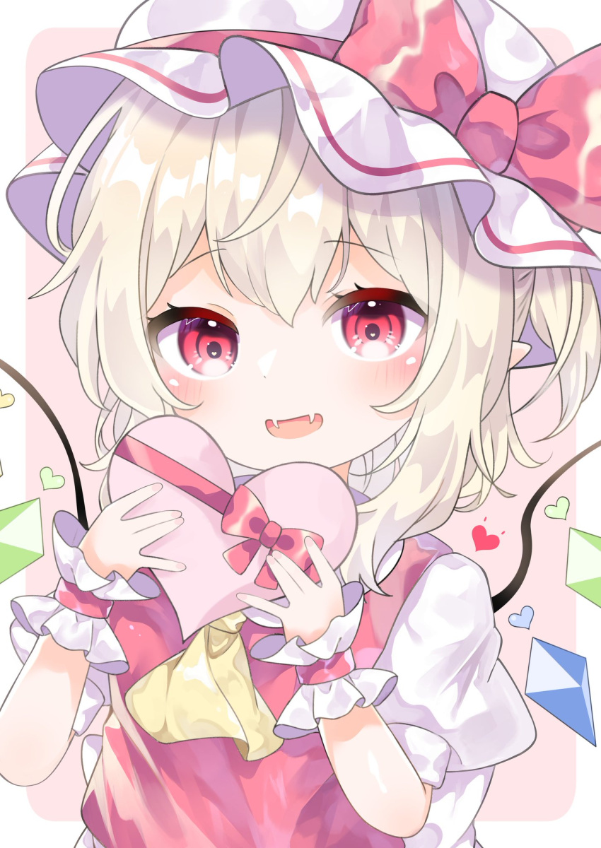 1girl ascot back_bow bangs blonde_hair blush border bow box breasts collared_shirt commentary_request crystal eyebrows_visible_through_hair fang fangs flandre_scarlet hair_between_eyes hands_up hat hat_bow heart heart-shaped_pupils highres jewelry looking_at_viewer mob_cap multicolored_wings one_side_up open_mouth pafe_yuzuran pink_background pink_bow pink_heart pointy_ears puffy_short_sleeves puffy_sleeves red_bow red_eyes red_heart red_vest shirt short_hair short_sleeves simple_background small_breasts smile solo symbol-shaped_pupils tongue touhou vest white_border white_bow white_headwear white_shirt wings wrist_cuffs yellow_ascot