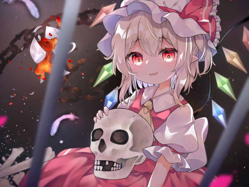 1girl :d ascot bangs blonde_hair blurry chain collared_shirt crystal depth_of_field eyebrows_visible_through_hair fire flandre_scarlet hat hat_ribbon highres holding holding_skull looking_at_viewer mob_cap open_mouth pafe_yuzuran pointy_ears red_eyes red_ribbon red_skirt red_vest ribbon shirt skirt skull smile touhou upper_body vest white_headwear white_shirt wings yellow_ascot