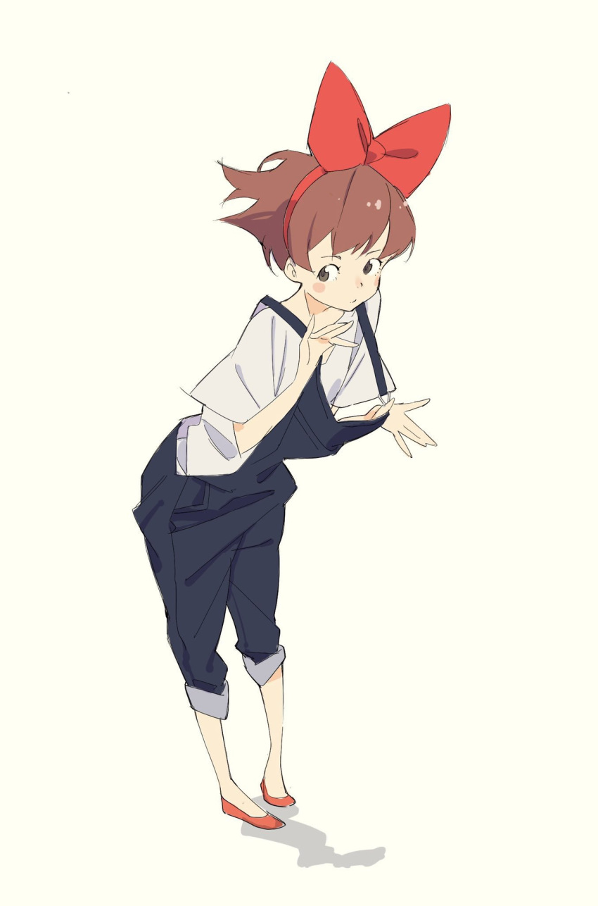 1girl bangs blush_stickers bow brown_hair casual floating_hair full_body hair_bow hairband highres leaning_forward looking_away majo_no_takkyuubin overalls pants pants_rolled_up popman3580 red_bow red_footwear shirt shoes short_hair short_sleeves sideways_glance simple_background solo standing strap_pull t-shirt white_shirt yellow_background