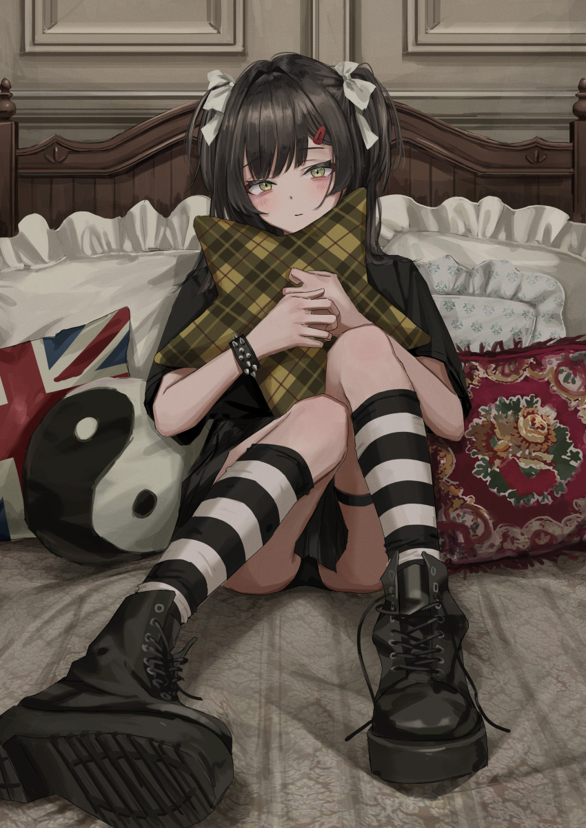 1girl absurdres ankle_boots black_footwear black_hair black_panties black_shirt boots bracelet closed_mouth commentary cross-laced_footwear english_commentary hair_ribbon highres hoshimaru jewelry knees_together_feet_apart looking_at_viewer medium_hair nadegata narutaru object_hug on_bed original panties pantyshot pillow pillow_hug ribbon shirt sitting socks solo spiked_bracelet spikes star_pillow striped striped_legwear twintails underwear white_ribbon yellow_eyes yin_yang