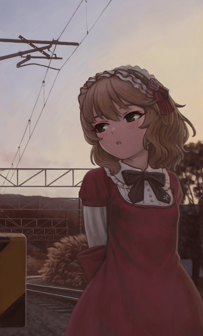 1girl absurdres arms_behind_back asagi_noko back_bow blonde_hair blush bow bowtie collar commentary_request dress flower frilled_collar frilled_hairband frills green_eyes hairband highres idolmaster idolmaster_cinderella_girls lolita_hairband looking_to_the_side outdoors overhead_line parted_lips railroad_tracks red_dress rose sakurai_momoka short_hair sky solo wavy_hair