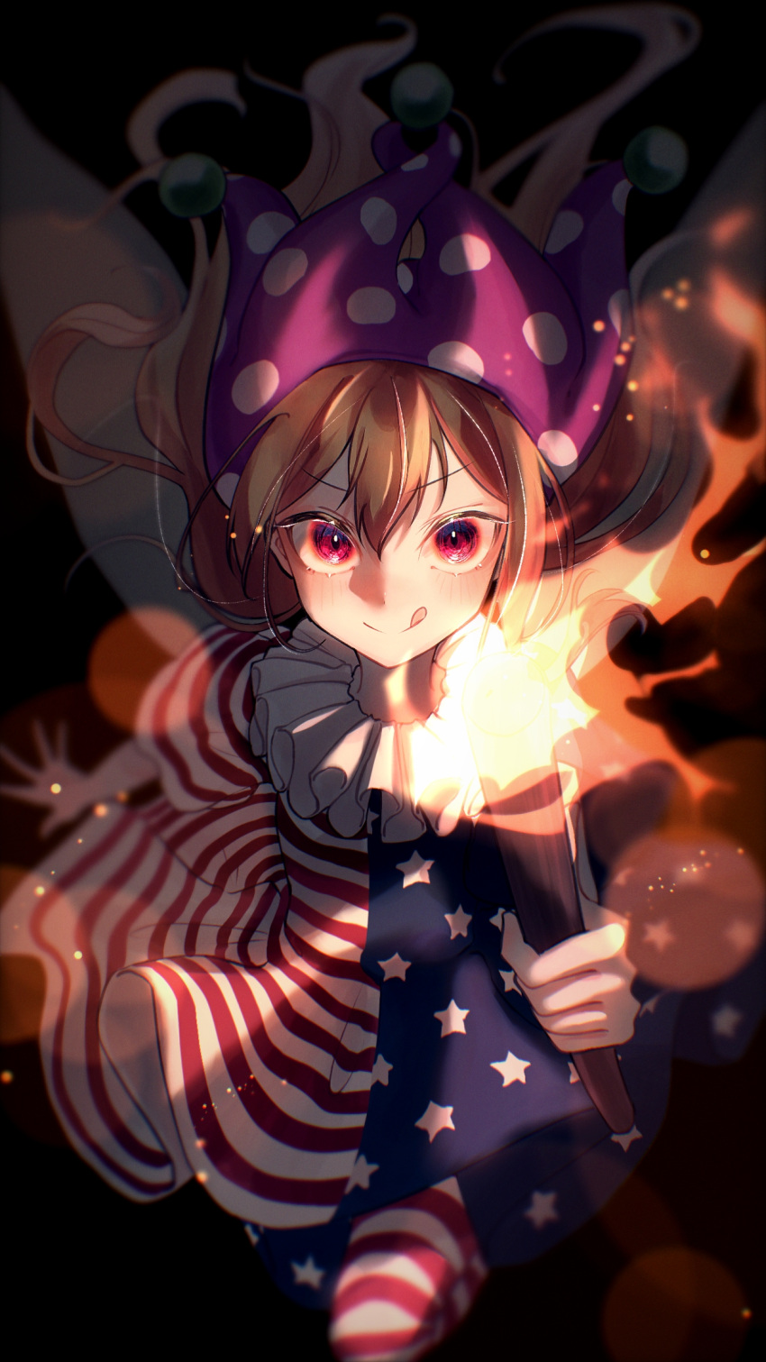1girl :q american_flag_dress american_flag_legwear bangs black_background blonde_hair blurry blush bokeh clownpiece dark depth_of_field eyebrows_visible_through_hair fairy_wings floating_hair hair_between_eyes hat highres holding holding_torch jester_cap light_particles long_hair looking_at_viewer neck_ruff pantyhose polka_dot_headwear purple_headwear red_eyes simple_background solo star_(symbol) star_print tongue tongue_out torch touhou violet_(mesy4285) wings
