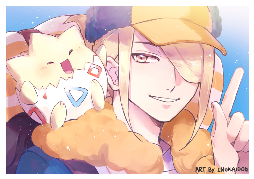1boy absurdres blonde_hair blue_jumpsuit blush border commentary_request dogdogwanwan hair_over_one_eye hand_up hat highres index_finger_raised jumpsuit male_focus on_shoulder parted_lips pokemon pokemon_(creature) pokemon_(game) pokemon_legends:_arceus pokemon_on_shoulder short_hair smile togepi volo_(pokemon) white_border yellow_headwear