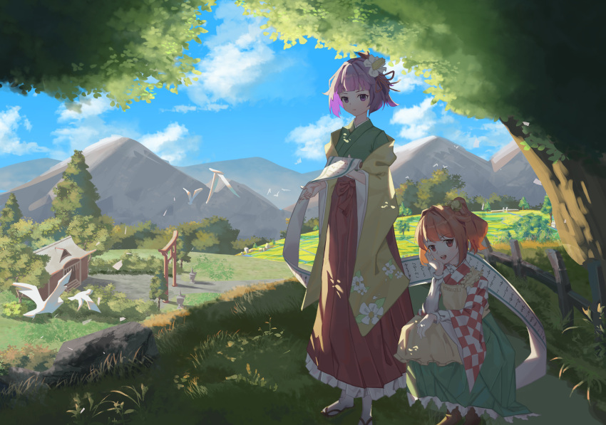 2girls :d :| absurdres al_guang apron bangs bell bird blunt_bangs blush character_name checkered_clothes checkered_kimono closed_mouth clothes_writing clouds commentary day eyebrows_visible_through_hair field flower full_body geta grass green_hakama green_kimono hair_bell hair_flower hair_ornament hair_ribbon hakama hand_on_own_cheek hand_on_own_face hand_up hands_up hieda_no_akyuu highres holding holding_scroll japanese_clothes kimono kneeling leaf long_sleeves looking_at_viewer motoori_kosuzu mountain mountainous_horizon multiple_girls orange_eyes orange_hair purple_hair red_hakama red_ribbon ribbon rock scenery scroll short_hair shrine sky smile socks standing stone_lantern teeth tongue torii touhou tree twintails upper_teeth violet_eyes water white_bird white_flower white_legwear wide_sleeves yellow_apron yellow_sleeves
