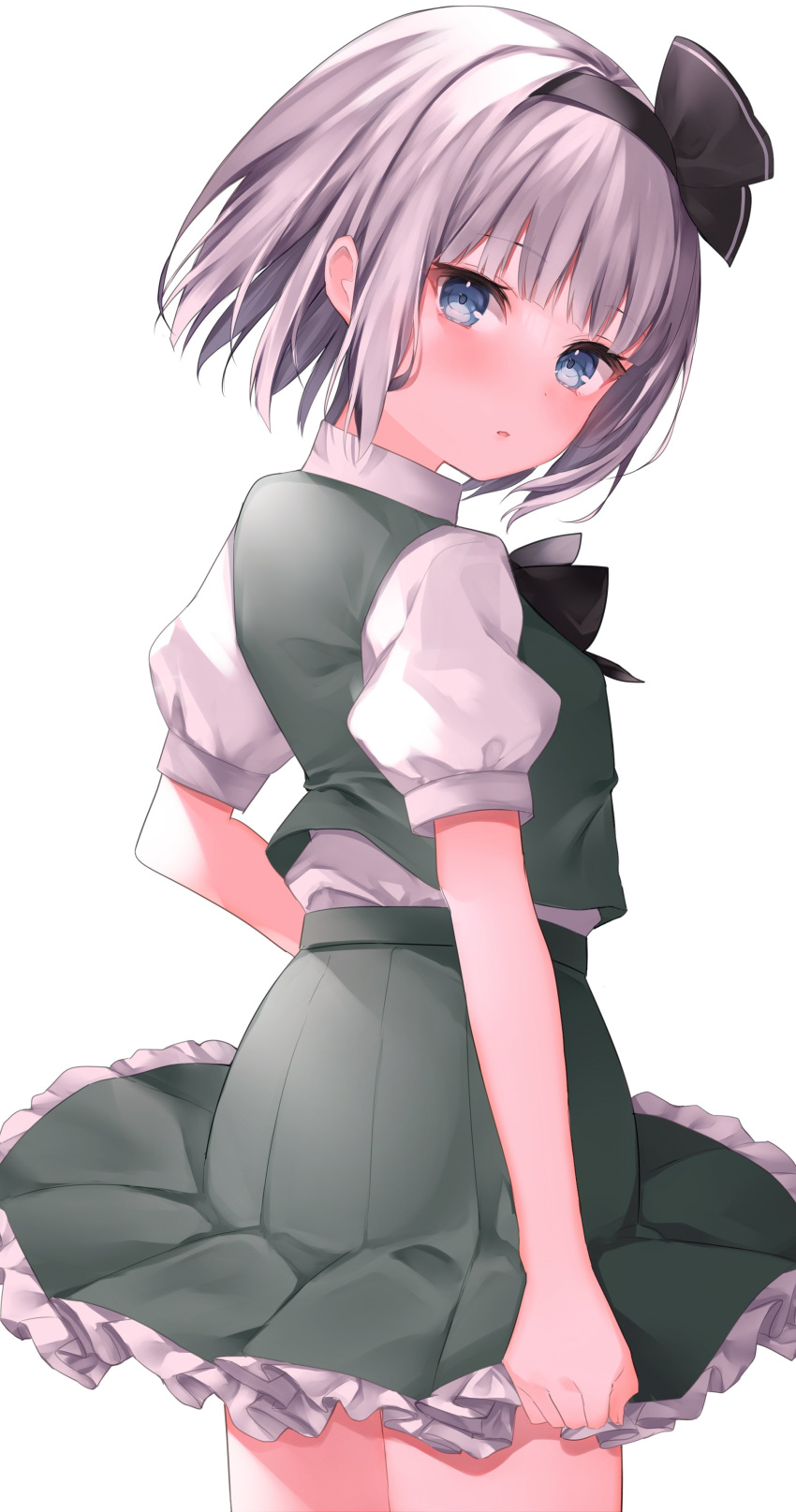 1girl absurdres bangs black_bow black_bowtie black_hairband blue_eyes blush bob_cut bow bowtie closed_mouth collared_shirt commentary_request cowboy_shot eyelashes frilled_skirt frills green_skirt green_vest hairband highres komomo_(ptkrx) konpaku_youmu looking_at_viewer looking_back pleated_skirt puffy_short_sleeves puffy_sleeves shirt short_hair short_sleeves silver_hair simple_background skirt solo standing touhou vest white_background white_shirt wing_collar
