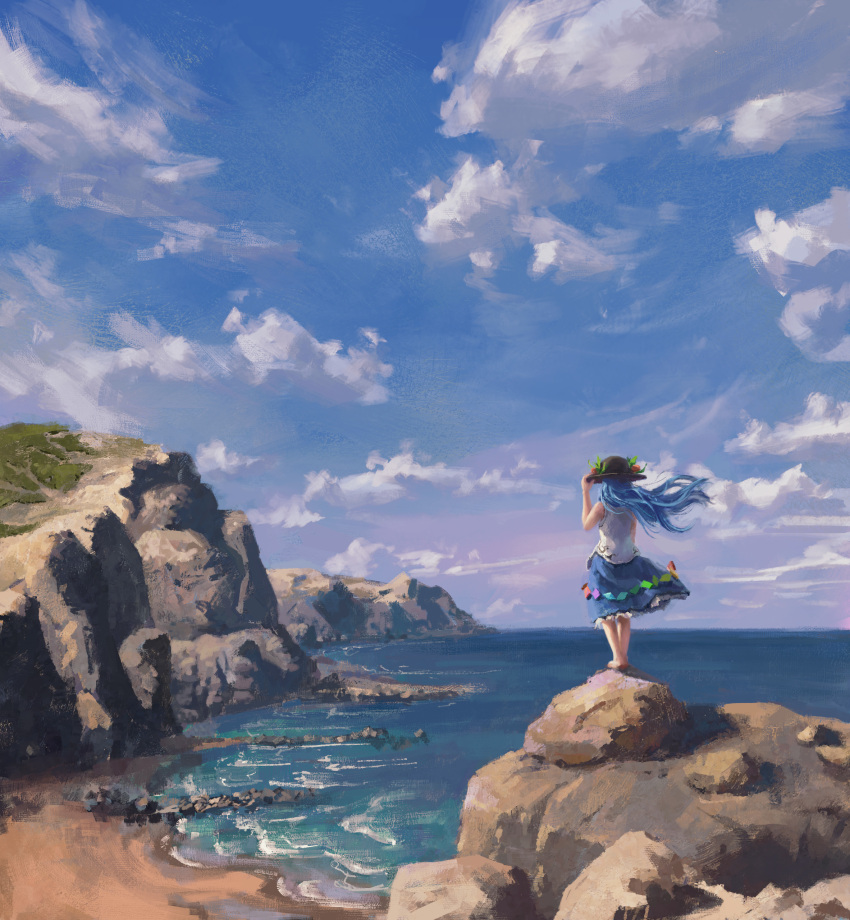 1girl absurdres barefoot beach black_headwear blue_hair blue_skirt blue_sky cliff clouds commentary day floating_hair food frilled_skirt frills from_behind fruit hand_on_headwear hat highres hinanawi_tenshi horizon landscape leaf long_hair ocean outdoors peach peach_hat_ornament rainbow_gradient reddizen rock scenery shirt shore skirt sky sleeveless sleeveless_shirt solo standing symbol-only_commentary touhou water white_shirt