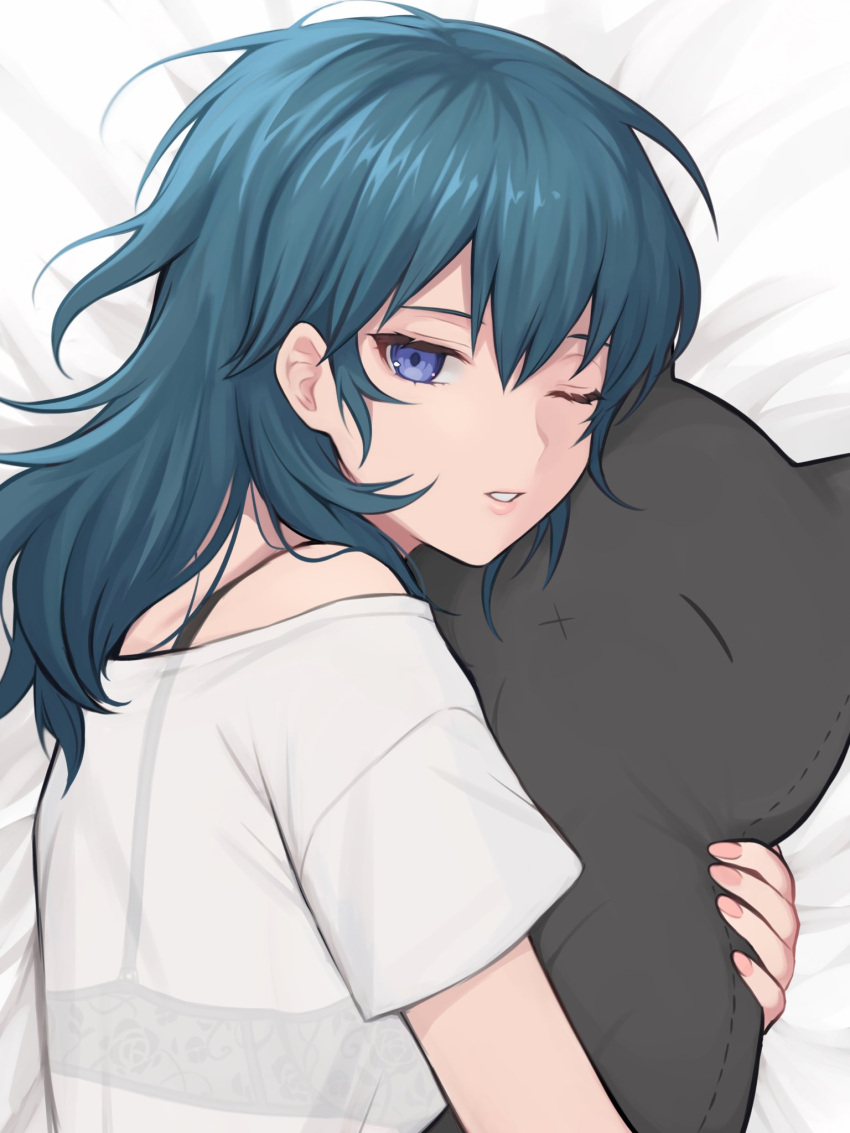 1girl bangs banned_artist bare_shoulders bed_sheet blue_eyes blue_hair bra byleth_(fire_emblem) byleth_eisner_(female) commentary_request fire_emblem fire_emblem:_three_houses highres holding holding_stuffed_toy long_hair looking_at_viewer object_hug off-shoulder_shirt off_shoulder one_eye_closed parted_lips see-through shimizu_akina shirt short_sleeves solo stuffed_toy underwear upper_body white_shirt