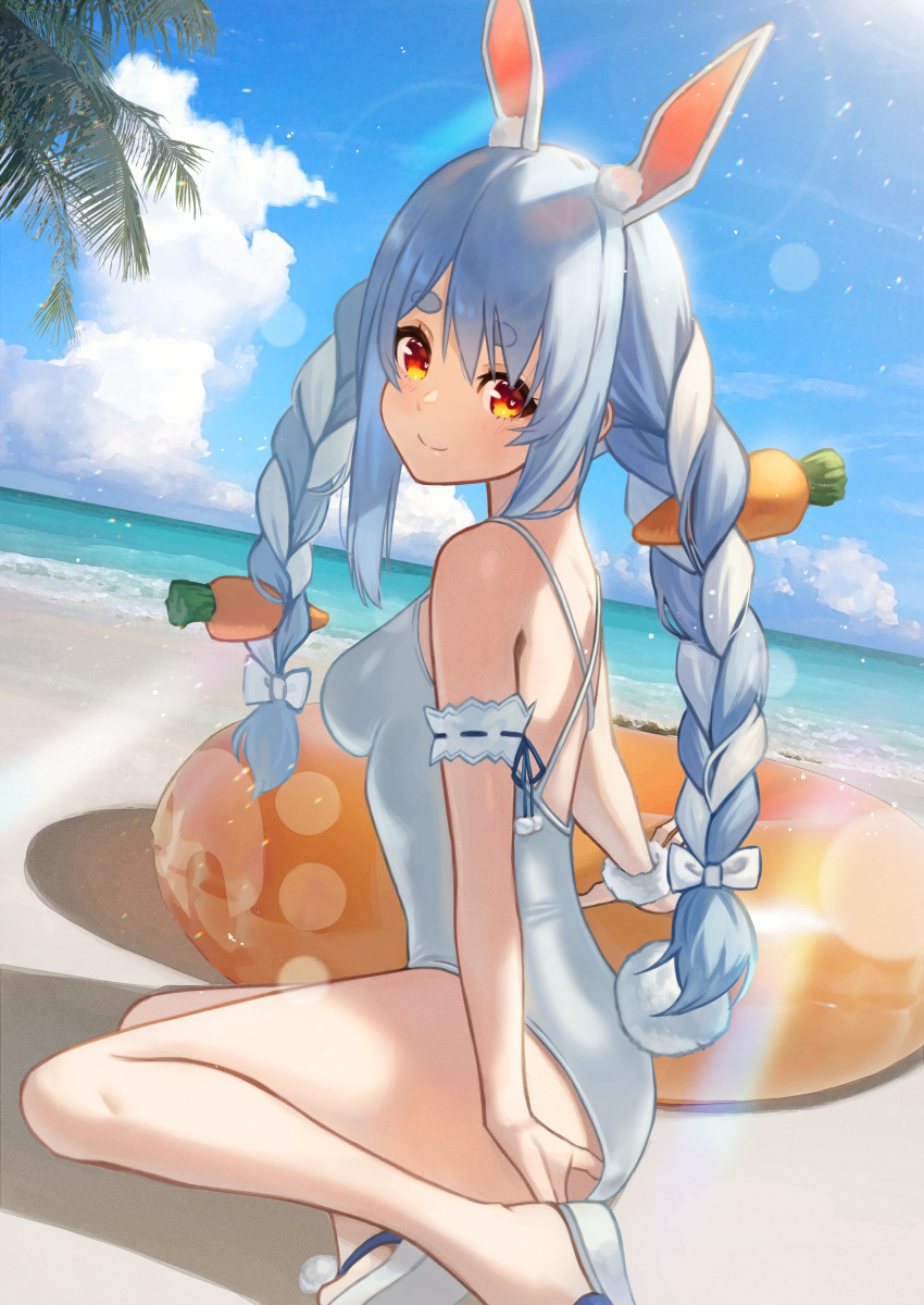 1girl absurdres animal_ears arm_garter beach blue_hair blue_sky blush bow braid carrot_hair_ornament closed_mouth clouds day food-themed_hair_ornament from_side hair_bow hair_ornament hara_kenshi highres hololive innertube long_hair looking_at_viewer multicolored_hair ocean one-piece_swimsuit orange_eyes rabbit_ears rabbit_girl rabbit_tail sand sandals short_eyebrows sitting sky smile solo sunlight swimsuit tail twin_braids two-tone_hair usada_pekora virtual_youtuber water white_hair white_swimsuit