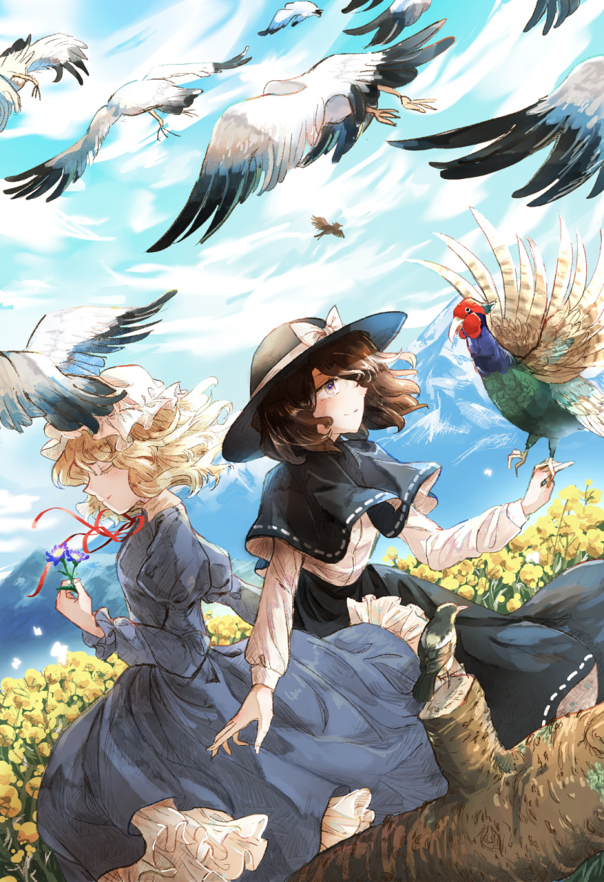 2girls bird bird_on_hand black_capelet black_headwear black_skirt blonde_hair blue_dress blush bow brown_eyes brown_hair capelet closed_eyes closed_mouth clouds cloudy_sky collared_dress commentary day dove dress eyebrows_behind_hair field fingernails flower flower_field frilled_dress frilled_sleeves frills hair_over_one_eye hat hat_bow highres holding holding_flower horo_uguisu log long_sleeves looking_at_animal maribel_hearn mob_cap mountain mountainous_horizon multiple_girls outdoors peacock purple_flower ribbon-trimmed_capelet ribbon-trimmed_skirt ribbon_trim shirt short_hair skirt sky sleeve_cuffs smile standing swallow_(bird) touhou usami_renko white_bow white_headwear white_shirt yellow_flower