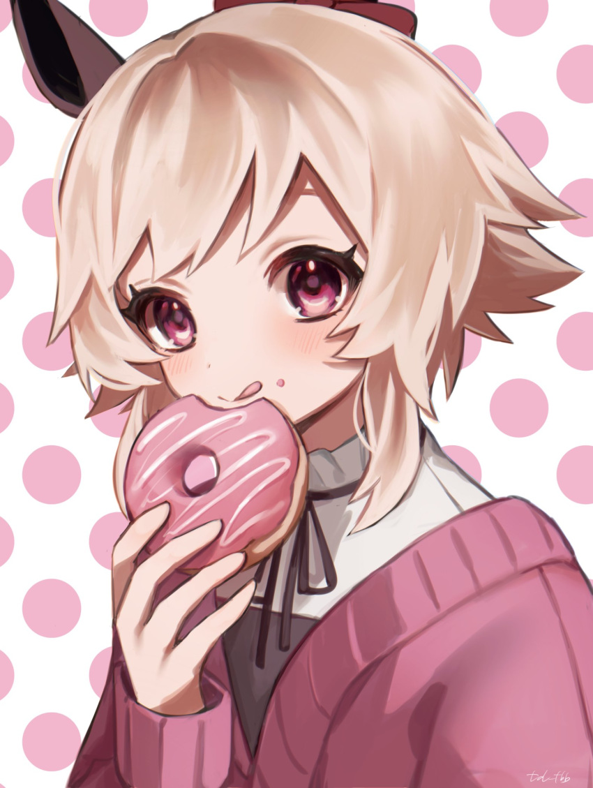 1girl animal_ears black_ribbon blush brown_hair closed_mouth curren_chan_(umamusume) dot_nose doughnut food food_on_face highres holding holding_food horse_ears medium_hair pink_eyes pink_sweater polka_dot polka_dot_background ribbon smile solo sweater tongue tongue_out twitter_username two-tone_background umamusume upper_body wa.