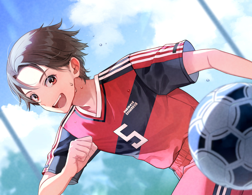 1boy arm_at_side ball black_shirt blue_sky brown_hair cherico clenched_hand clouds day dutch_angle hand_up highres male_focus multicolored_shirt open_mouth original playing_sports red_eyes red_shirt red_shorts shirt short_hair short_sleeves shorts sky soccer soccer_ball soccer_uniform solo sportswear sweat