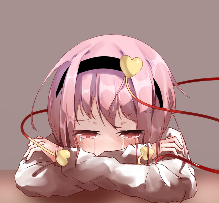 1girl bangs black_hairband blouse blush commentary covering_mouth crying crying_with_eyes_open english_commentary eyebrows_visible_through_hair grey_background hair_between_eyes hair_ornament hairband head_rest heart heart_hair_ornament komeiji_satori long_sleeves looking_down pink_eyes pink_hair shiny shiny_hair short_hair shuiqyyu simple_background solo streaming_tears tears touhou upper_body white_blouse wooden_table