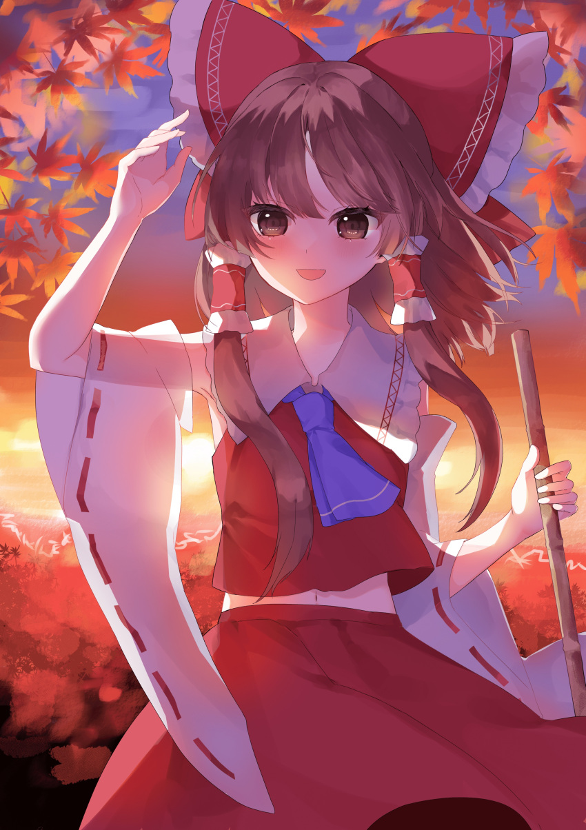1girl absurdres arm_up ascot autumn_leaves blue_neckwear bow brown_eyes brown_hair detached_sleeves hair_bow hair_tubes hakurei_reimu highres leaf long_hair looking_at_viewer maple_leaf open_mouth outdoors red_skirt ribbon-trimmed_sleeves ribbon_trim rori82li shirt skirt smile solo touhou
