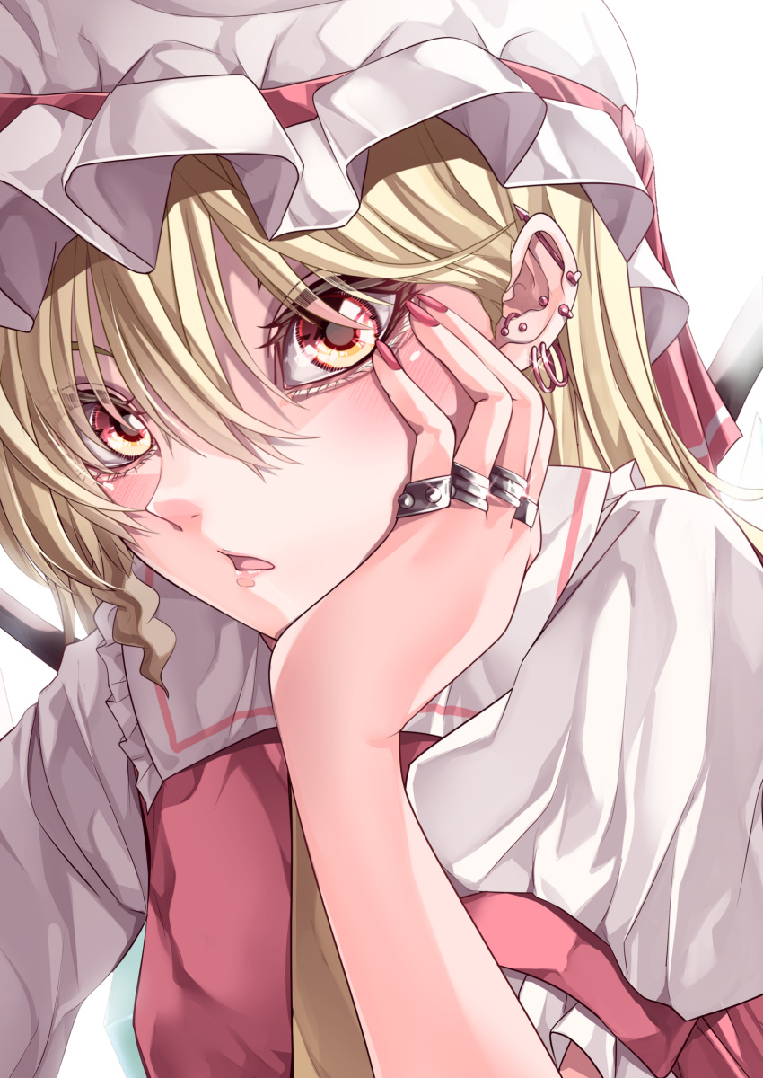 1girl absurdres blonde_hair breasts collared_shirt commentary ear_piercing earrings eyebrows_behind_hair flandre_scarlet frilled_shirt_collar frills hair_between_eyes hand_on_own_cheek hand_on_own_face hat hat_ribbon highres jewelry looking_at_viewer maboroshi_mochi mob_cap nail_polish open_mouth piercing pink_nails puffy_short_sleeves puffy_sleeves red_eyes red_ribbon red_vest ribbon ring shirt short_sleeves small_breasts solo touhou upper_body vest white_headwear white_shirt wings